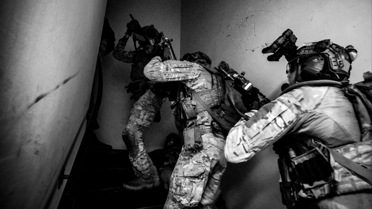 "A group of marine commando counter-terrorism and hostage release (CTLO) specialists gain entry to a building during the "Kraken" exercise." © Johan
